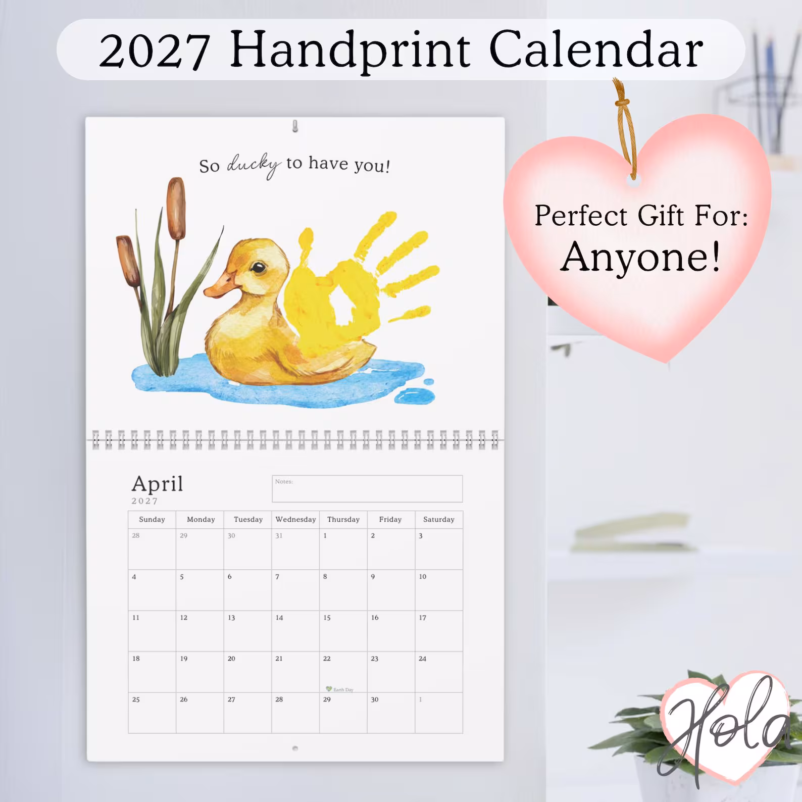 minimal style handprint calendar with handprints on each monthly page